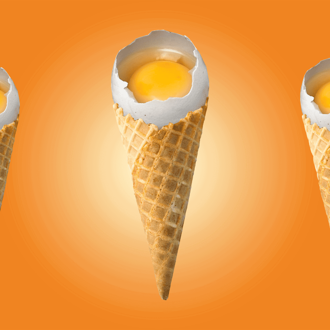 ice cream cones containing egg yolks on orange background