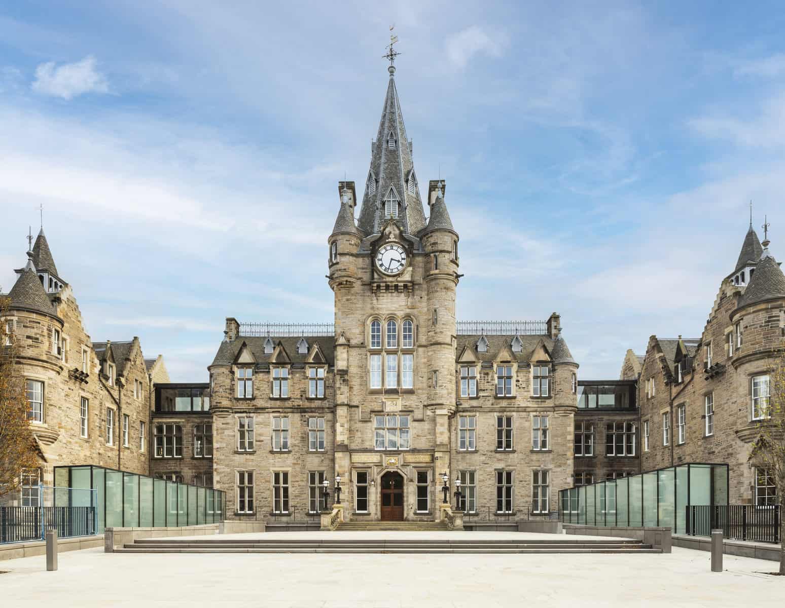 Architects Bennetts Associates. Client University Of Edinburgh. Contractor Balfour Beatty. Brick clocktower and front entrance of EFI building.