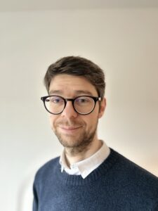 Headshot of Tobi Schneider