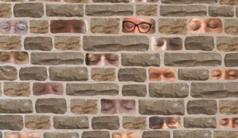 Brick wall with eyes superimposed
