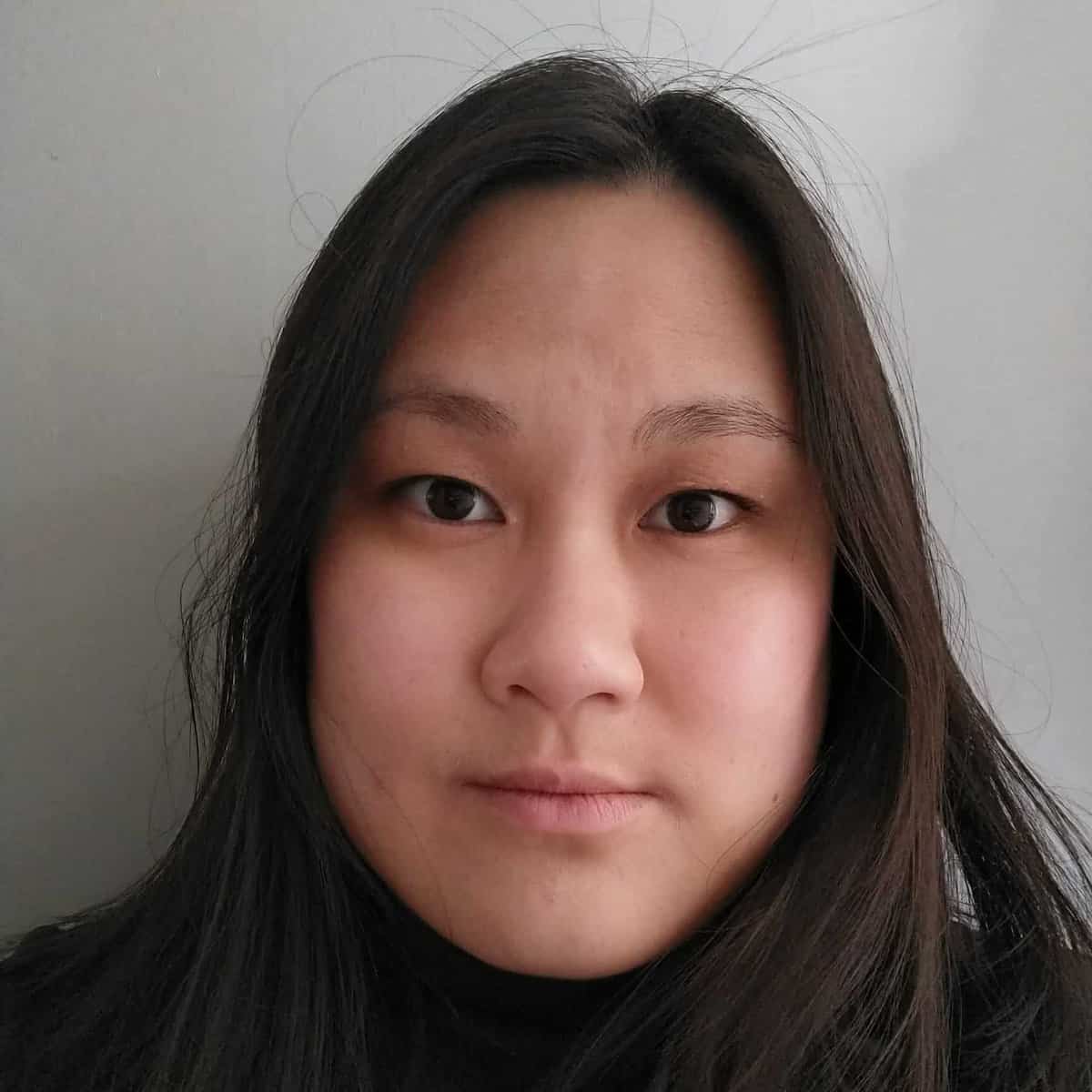 Headshot of Kam Chan